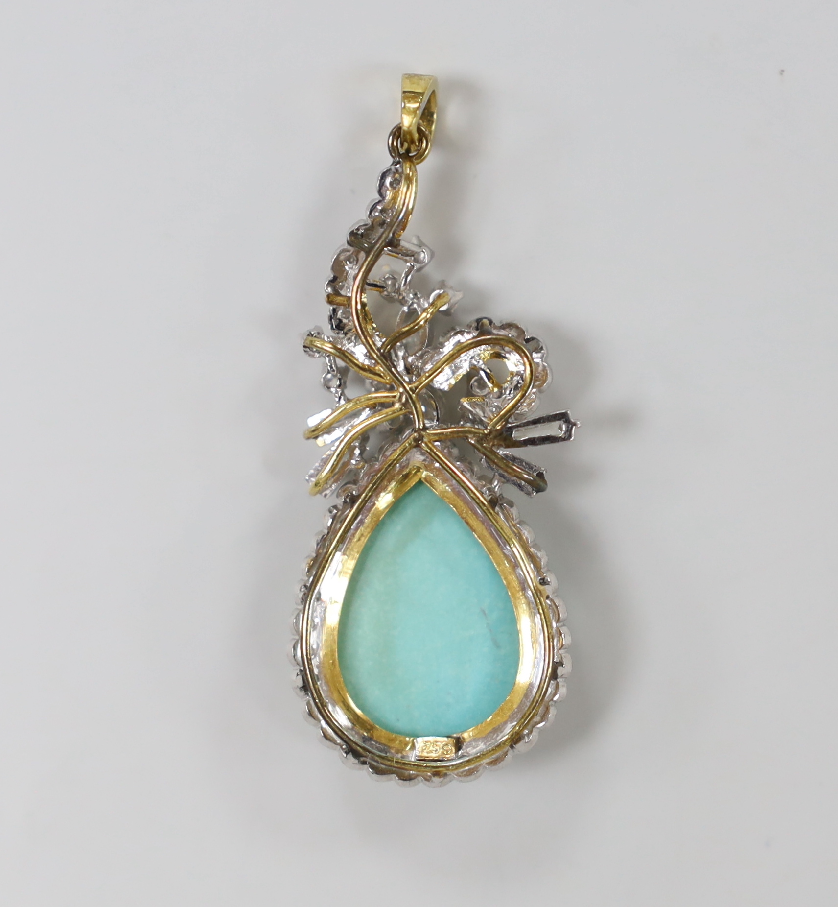 A modern 750 yellow metal, turquoise and diamond cluster set drop pendant, 47mm, gross weight 6.8 grams.